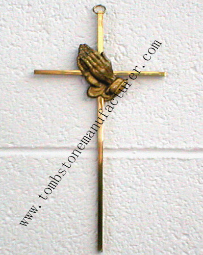 bronze cross with praying hands
